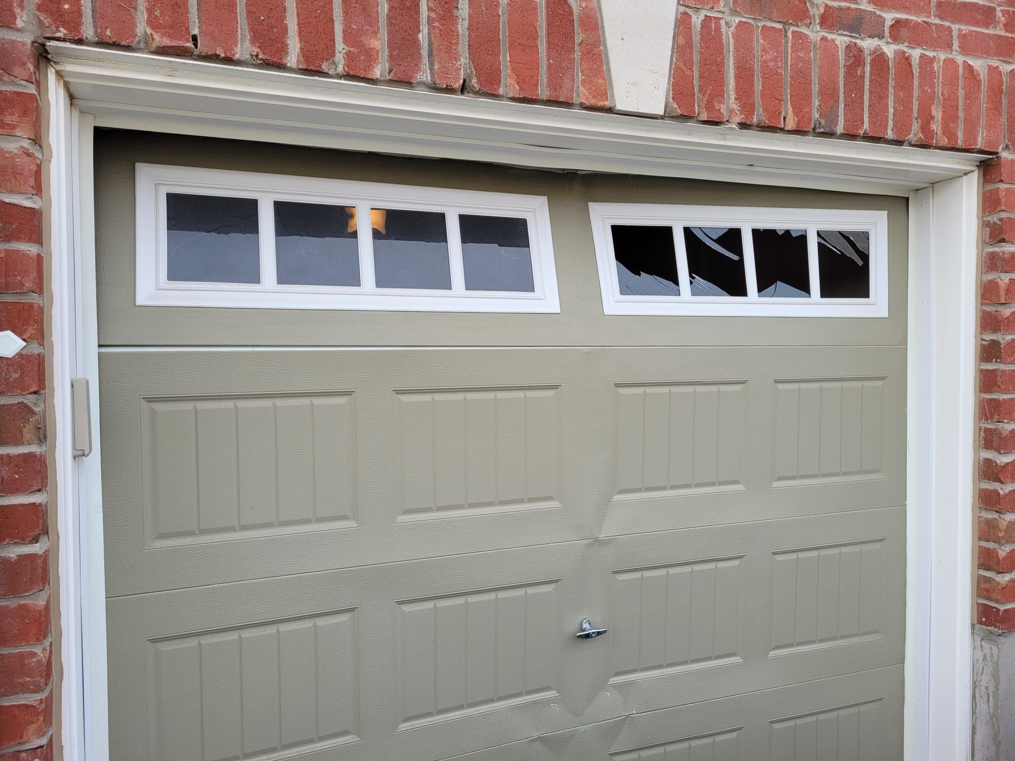 Damaged Garage Door Panel